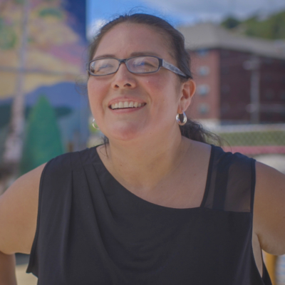 An enormous portrait of an Ojibwe woman is a symbol of resilience, according to supporters.  Painted on an exterior wall of the American Indian Community Housing Organization (AICHO)